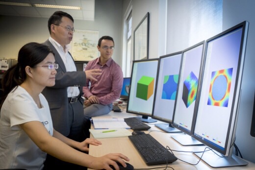 Doctoral student Bo Peng (at left), associate professor Wenbin Yu (center) and doctoral student Ernesto Camarena conduct research on SwiftComp, software developed by Yu that reduces the design cycle of materials and structures. The software also analyzes models too complex for existing methods. North Logan, Utah-based AnalySwift, a commercial software provider, has licensed SwiftComp through the Purdue Research Foundation Office of Technology Commercialization. 