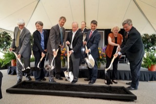 More than 200 people attended the Indiana Manufacturing Institute groundbreaking on Tuesday (June 23) at the Purdue Research Park of West Lafayette. The $50 million project will advance Purdue University research of composite materials manufacturing to develop stronger, more energy-efficient technologies. From left are Gary Bertoline, dean of Purdue Polytechnic Institute; Kelly Visconti, technology manager for the U.S. Department of Energy Advanced Manufacturing Office; John Dennis, mayor of West Lafayette; Mitch Daniels, president of Purdue University; R. Byron Pipes, John Leighton Bray Distinguished Professor of Engineering; Victor Smith, Indiana Secretary of Commerce; Leah Jamieson, John A. Edwardson Dean of Engineering; and Dan Hasler, president of the Purdue Research Foundation. (Purdue Research Foundation photo) 
