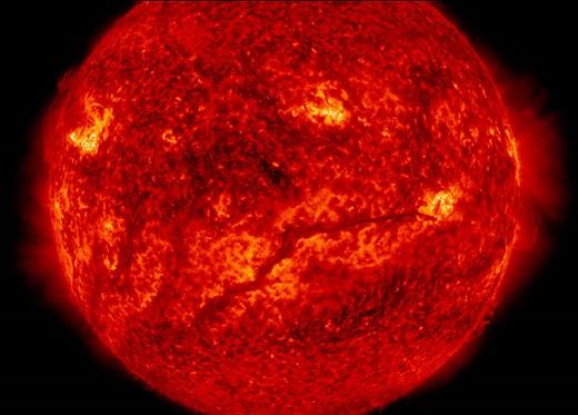 A filament stretches across the lower half of the sun in this image captured by NASA’s Solar Dynamics Observatory on Feb. 10, 2015. Filaments are huge tubes of relatively cool solar material held high up in the corona by magnetic fields. Researchers simulated how the material moves in filament threads to explore how a particular type of motion could contribute to the extremely hot temperatures in the sun’s upper atmosphere, the corona.