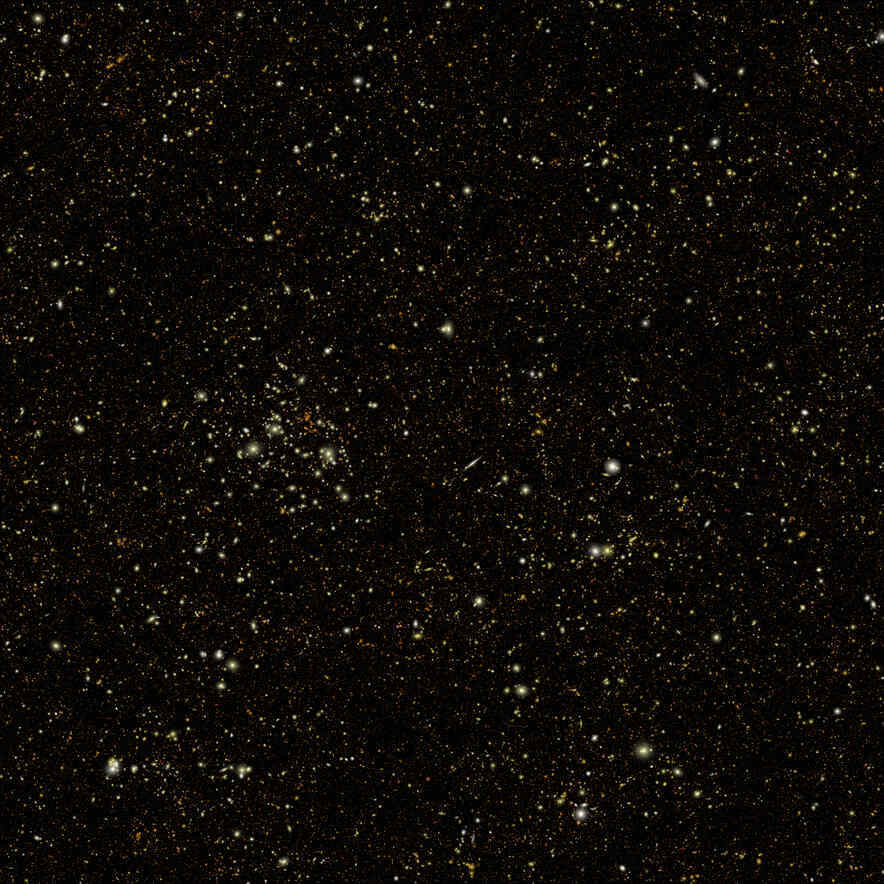 This simulated Roman deep field image, containing hundreds of thousands of galaxies, represents just 1.3 percent of the synthetic survey, which is itself just one percent of Roman's planned survey. The full simulation is available here. The galaxies are color coded – redder ones are farther away and whiter ones are nearer. The simulation showcases Roman’s power to conduct large, deep surveys and study the universe statistically in ways that aren’t possible with current telescopes. Credits: M. Troxel and Caltech-IPAC/R. Hurt