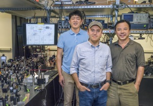 Taiki Hatakeyama, Michael Mrejen and Xiang Zhang led development of a technique to control light in closely packed nanoscale waveguides for integrated photonic circuitry. (Photo by Roy Kaltschmidt) Taiki Hatakeyama, Michael Mrejen and Xiang Zhang led development of a technique to control light in closely packed nanoscale waveguides for integrated photonic circuitry. (Photo by Roy Kaltschmidt)