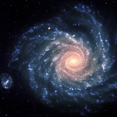 Image of the large spiral galaxy NGC 1232. The colours of the different regions are well visible: the central areas contain older stars of reddish colour, while the spiral arms are populated by young, blue stars and many star-forming regions. Credit: ESO