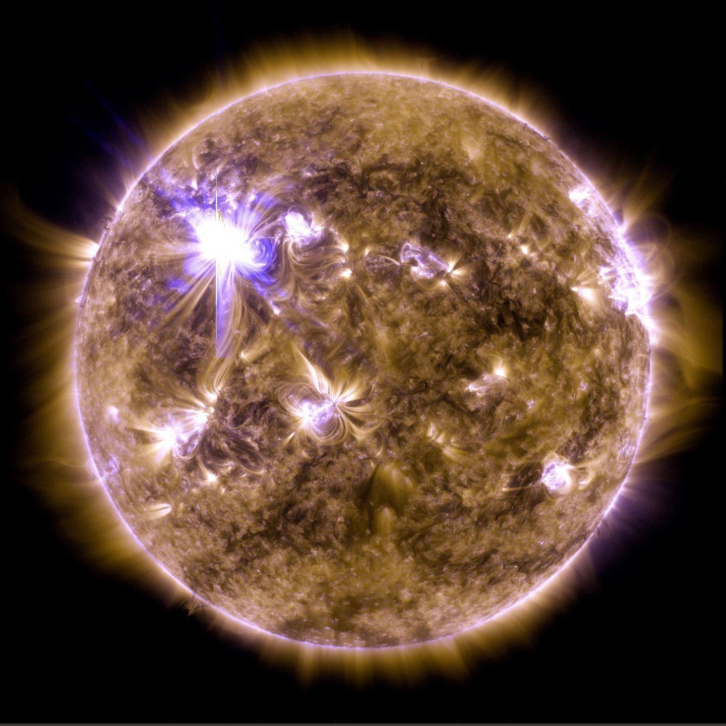 An X-class solar flare flashes on the edge of the Sun on March 7, 2012. This image was captured by NASA's Solar Dynamics Observatory and shows a type of light that is invisible to human eyes, called extreme ultraviolet light.