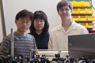 Rice University researchers, from left, Junichiro Kono, Ji-Hee Kim and Timothy Noe discovered a way to extract superfluorescent bursts of light from solid-state materials without the need for a magnetic field. Their work appears in the journal Scientific Reports. Jeff Fitlow/Rice University Flashes of brilliance