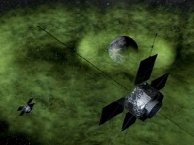 This is a graphic depiction of NASA's Van Allen Probes orbiting within Earth's radiation belts. Van Allen Probes shed light on decades-old mystery