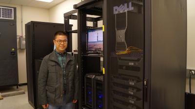 Graduate student Mingming Li in collaboration with ASU professors Allen McNamara and Ed Garnero developed new simulations that depict the dynamics of deep Earth. Here, Li stands in front of the massive computer clusters required for running the calculations. By: Allen McNamara Graduate student Mingming Li in collaboration with ASU professors Allen McNamara and Ed Garnero developed new simulations that depict the dynamics of deep Earth. Here, Li stands in front of the massive computer clusters required for running the calculations. By: Allen McNamara
