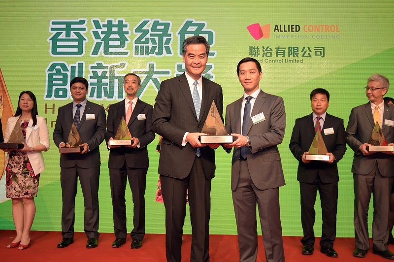 Kar-Wing Lau, VP of Operations at Allied Control with an award. Kar-Wing Lau, VP of Operations at Allied Control with an award.