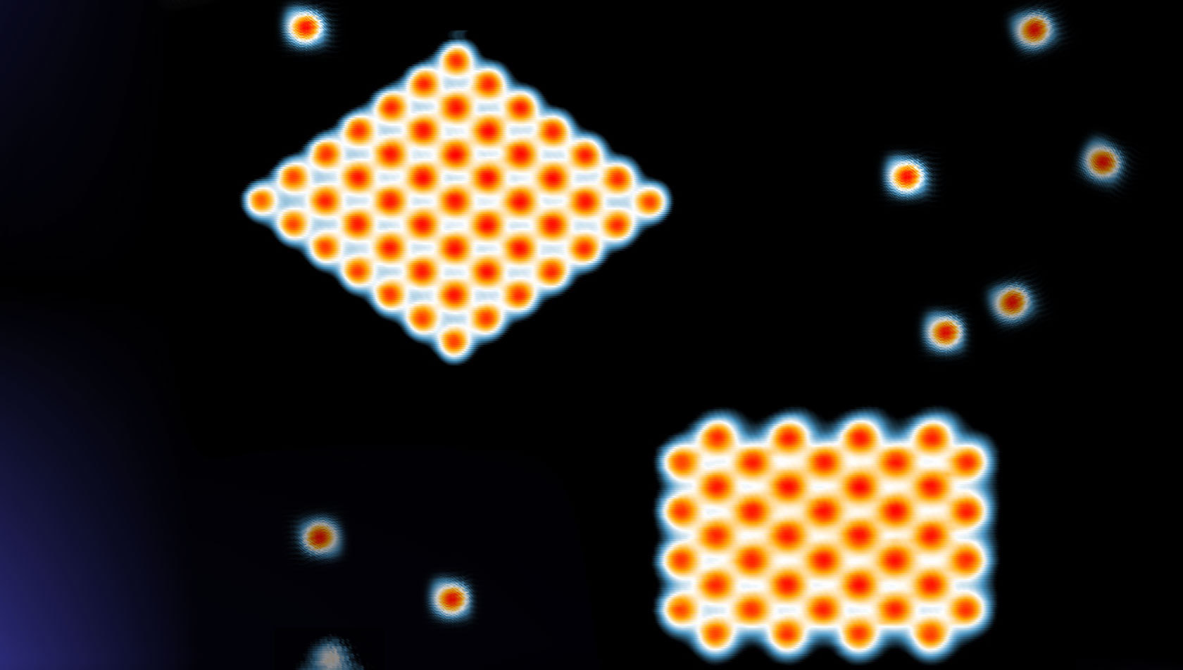 Scanning tunnelling microscope image of two of the superconducting structures created, which consist of individual chromium atoms. Scanning tunnelling microscope image of two of the superconducting structures created, which consist of individual chromium atoms.