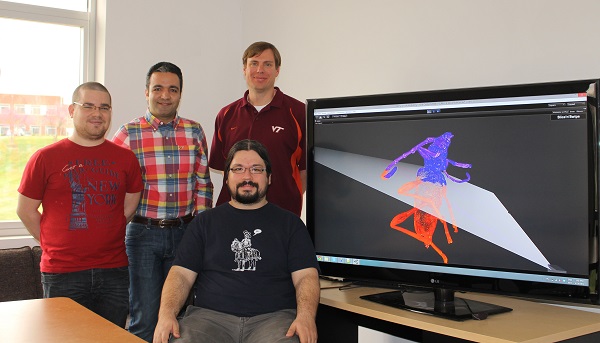 The team members, pictured from left to right, standing, are Cristian Moral Martos of Madrid, Spain; Mahdi Nabiyouni of Tehran, Iran; and Doug Bowman, faculty adviser and professor of computer science at Virginia Tech. Seated is Felipe Bacim of Porto Alegre, Brazil. The team members, pictured from left to right, standing, are Cristian Moral Martos of Madrid, Spain; Mahdi Nabiyouni of Tehran, Iran; and Doug Bowman, faculty adviser and professor of computer science at Virginia Tech. Seated is Felipe Bacim of Porto Alegre, Brazil.