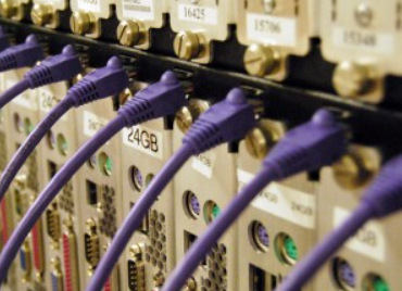 Each rack holds 52 Angstrom Microsystem-brand “blades,” with a memory footprint of 12 or 24 gigabytes each. (Photos by Olivia Bartlett Drake)