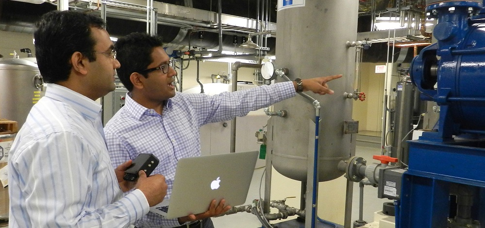 Lokesh Gupta, from left, and Anurag Garg of Bearing Analytics survey locations to install the company's sensors that monitor industrial rotating systems. Bearing Analytics is one of more than 20 startups created in fiscal year 2014 from Purdue University innovations. (Purdue Research Foundation photo) Lokesh Gupta, from left, and Anurag Garg of Bearing Analytics survey locations to install the company's sensors that monitor industrial rotating systems. Bearing Analytics is one of more than 20 startups created in fiscal year 2014 from Purdue University innovations. (Purdue Research Foundation photo)