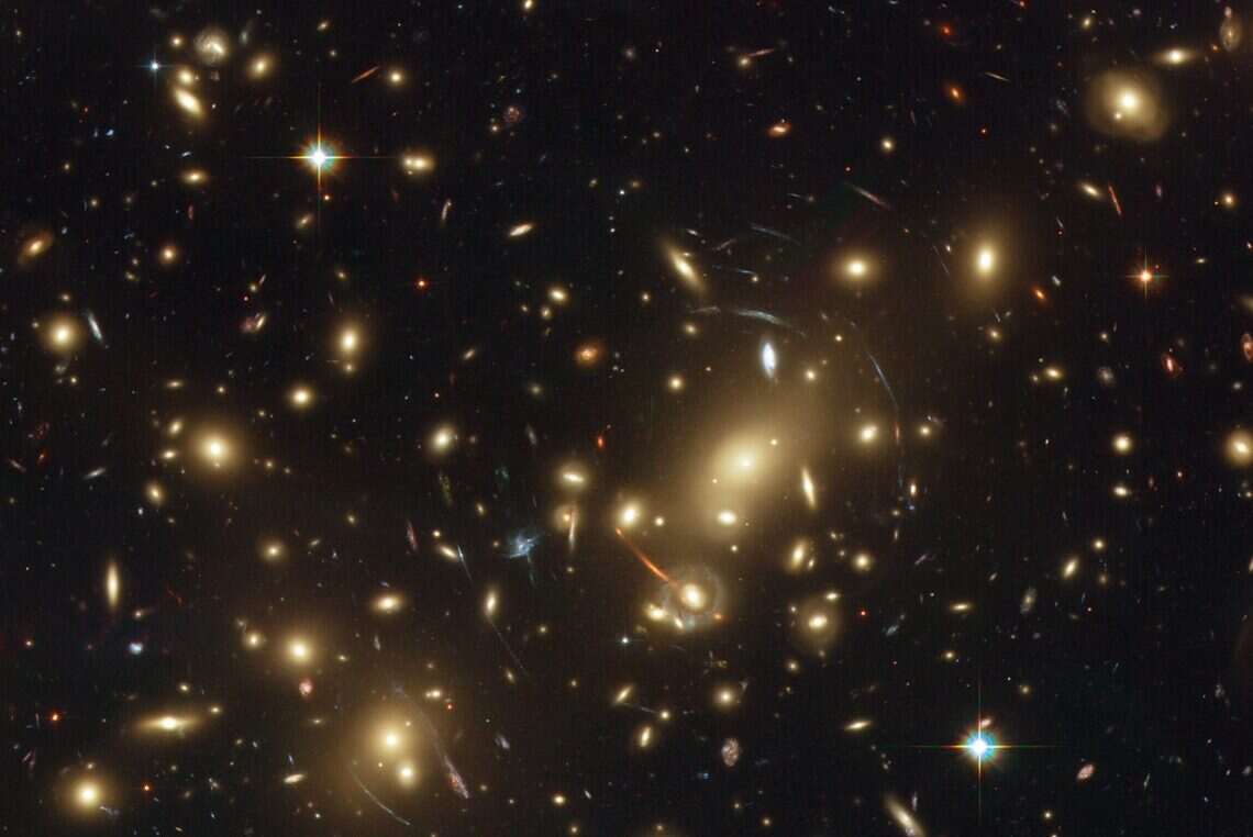 Image of Abell 2218, a dense galactic cluster located approximately 2 billion light years from Earth. Courtesy of NASA/ESA/Johan Richard. Image of Abell 2218, a dense galactic cluster located approximately 2 billion light years from Earth. Courtesy of NASA/ESA/Johan Richard.