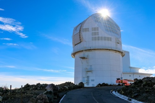 Inouye Solar Telescope with open aperture: Inouye Solar Telescope with an open aperture and blue skies near Haleakalā summit, Maui, HI.